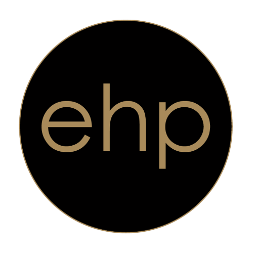 Round Easihair Pro logo on black and gold